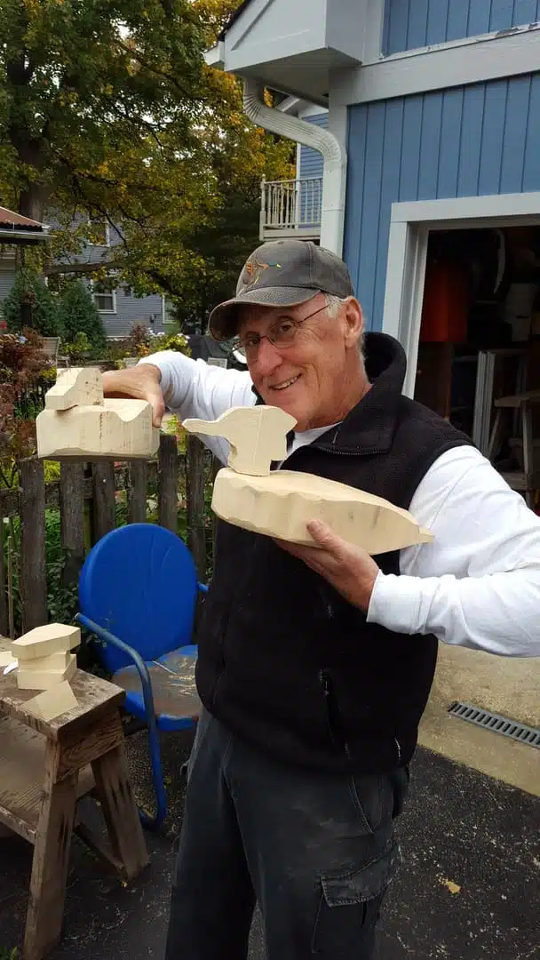 RIck MIgnano with carved wooden birds